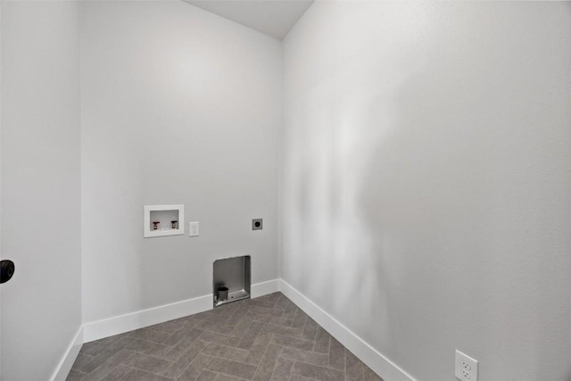 1510 Cardinal Dr, Fairfax, IA 52228 - laundry room featuring hookup for an electric dryer, washer hookup, and baseboards