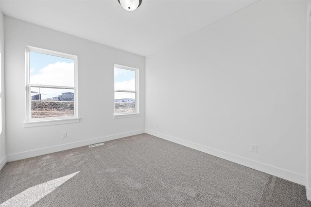 1510 Cardinal Dr, Fairfax, IA 52228 - carpeted spare room with baseboards