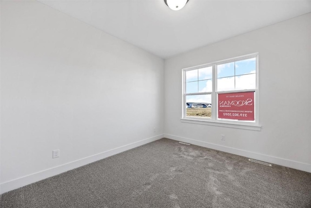 1510 Cardinal Dr, Fairfax, IA 52228 - carpeted spare room with baseboards