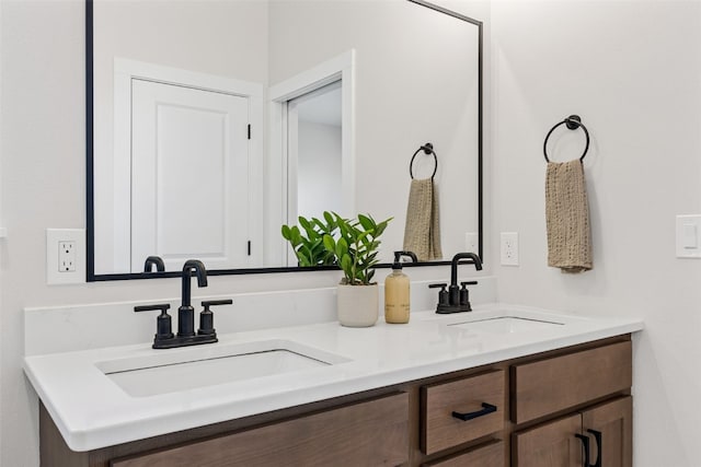 1510 Cardinal Dr, Fairfax, IA 52228 - bathroom featuring double vanity