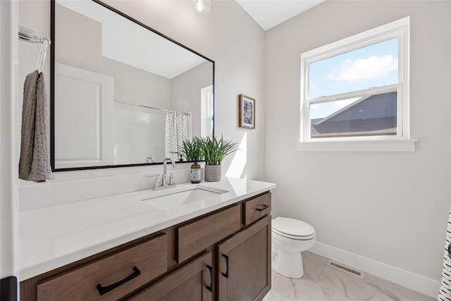 1510 Cardinal Dr, Fairfax, IA 52228 - bathroom with marble look tile flooring, vanity, toilet, baseboards, and curtained shower