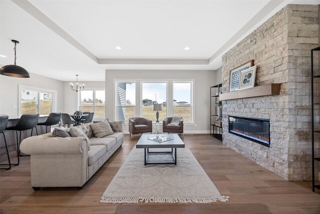 1510 Cardinal Dr, Fairfax, IA 52228 - living room with a chandelier, wood finished floors, healthy amount of natural light, and recessed lighting