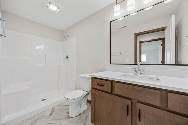 1519 Cardinal Dr, Fairfax, IA 52228 - bathroom with vanity, a shower, and marble finish flooring