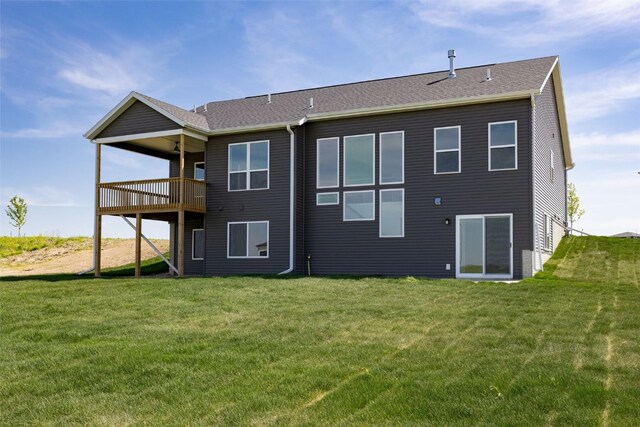 1519 Cardinal Dr, Fairfax, IA 52228 - back of house featuring a lawn and roof with shingles