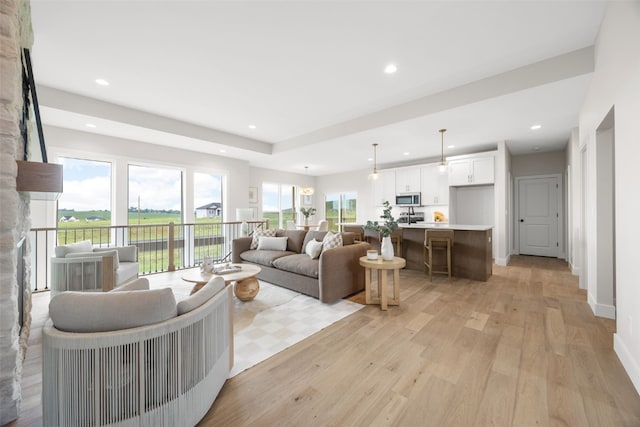 1519 Cardinal Dr, Fairfax, IA 52228 - living area with light wood-style flooring and recessed lighting