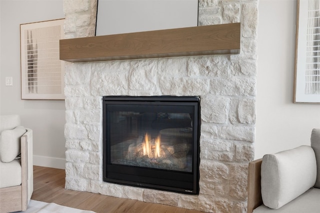 1519 Cardinal Dr, Fairfax, IA 52228 - detailed view of wood finished floors and a fireplace