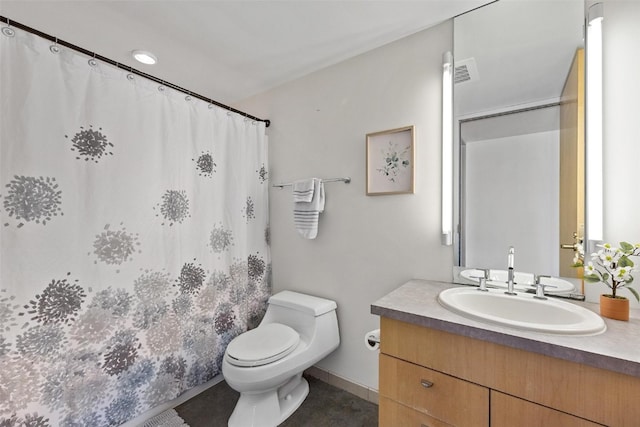 bathroom with tile patterned floors, vanity, toilet, and a shower with shower curtain