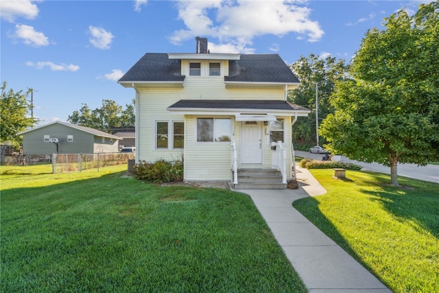 view of front of home with a front lawn