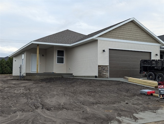 view of front of home with a garage