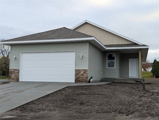 view of front of property featuring a garage