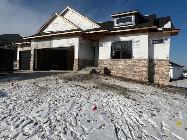 view of front of property with a garage