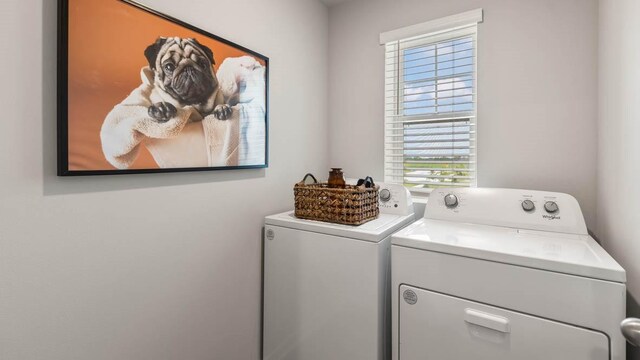 laundry area featuring independent washer and dryer