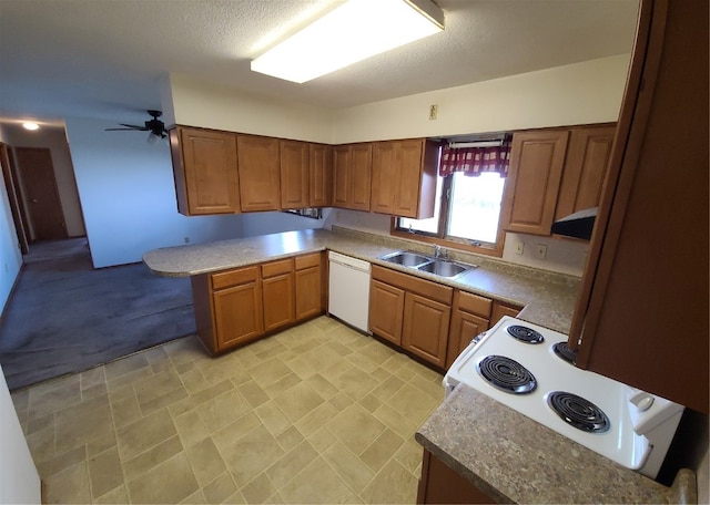 kitchen featuring sink, range hood, kitchen peninsula, white appliances, and ceiling fan