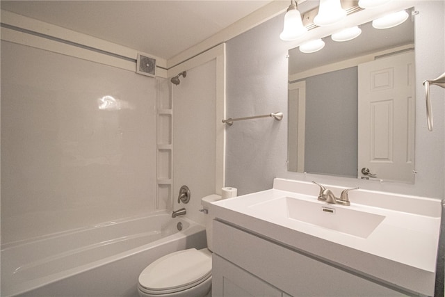 full bathroom with bathing tub / shower combination, vanity, and toilet