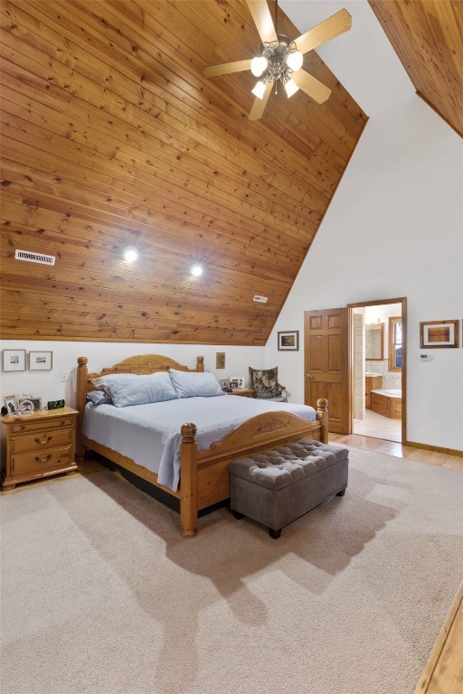 bedroom with ceiling fan, carpet floors, wooden ceiling, and high vaulted ceiling