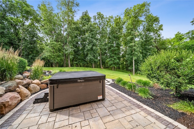 view of patio with a hot tub