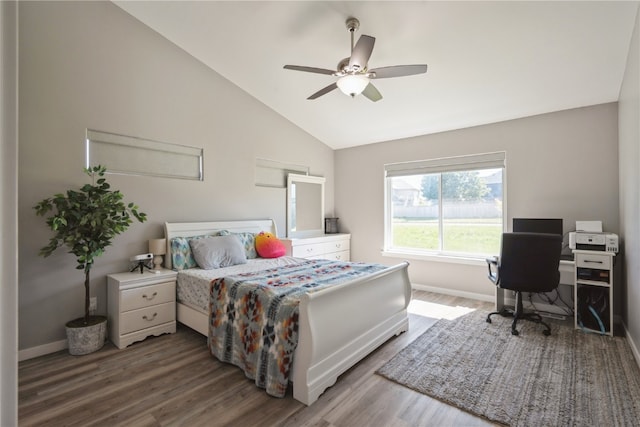 bedroom featuring vaulted ceiling, ceiling fan, and hardwood / wood-style floors