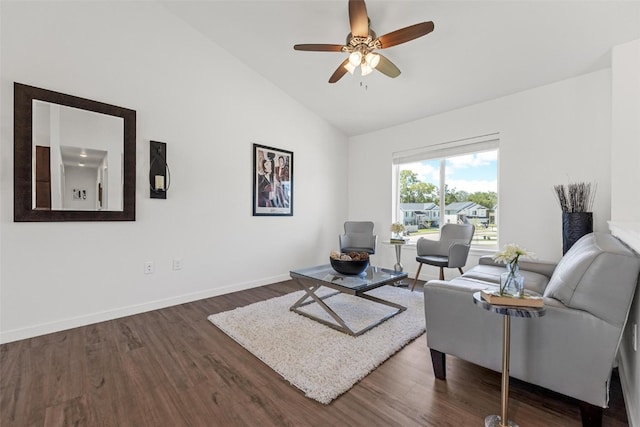 living room with high vaulted ceiling, ceiling fan, and dark wood-type flooring