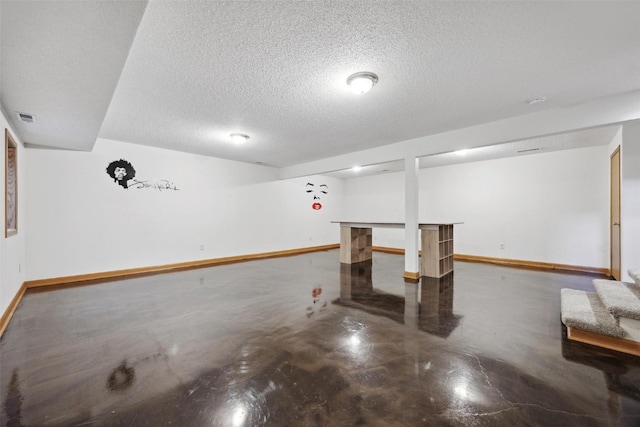 basement with a textured ceiling