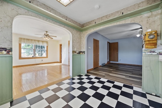 interior space featuring ceiling fan and hardwood / wood-style flooring