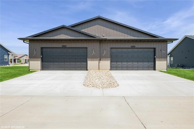 2390 Bluegrass St, Marion, IA 52302 - view of front of house with driveway and an attached garage