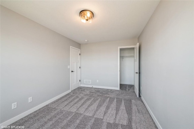 unfurnished bedroom featuring carpet floors