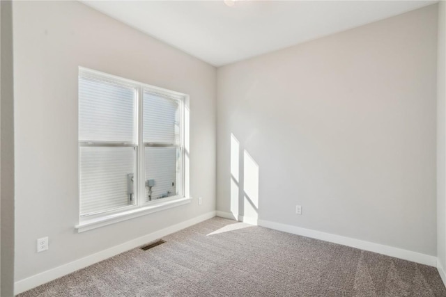 view of carpeted spare room