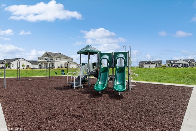 view of jungle gym with a yard