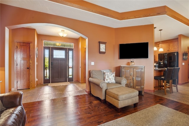 foyer featuring dark wood-type flooring