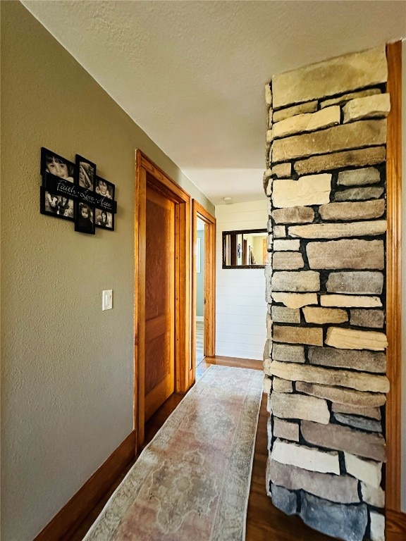 hall featuring dark wood-type flooring