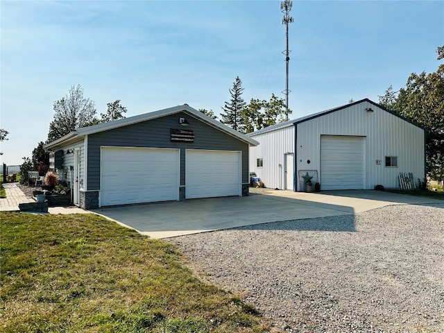 garage featuring a yard