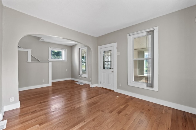 foyer entrance with wood-type flooring