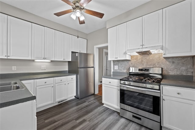 kitchen with ceiling fan, white cabinets, sink, dark wood-type flooring, and appliances with stainless steel finishes