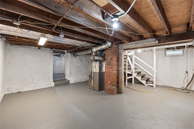 basement featuring heating unit