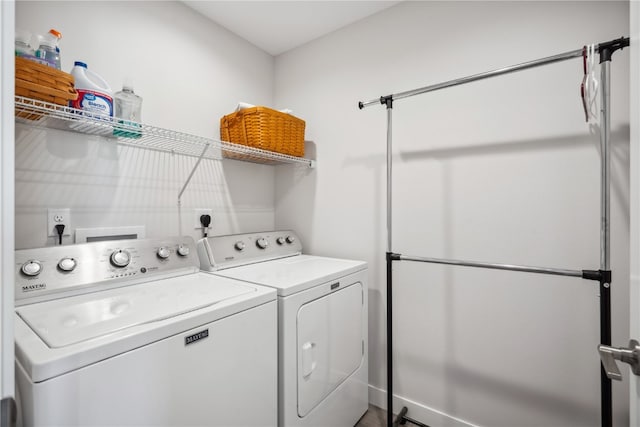 clothes washing area with independent washer and dryer