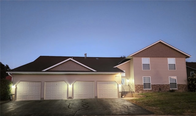 front of property with a garage