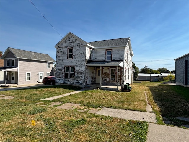 view of front of house with a front lawn