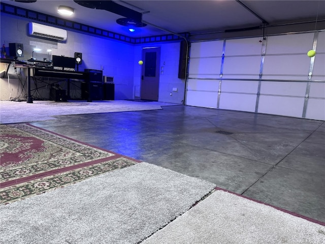 garage with a garage door opener and a wall mounted air conditioner