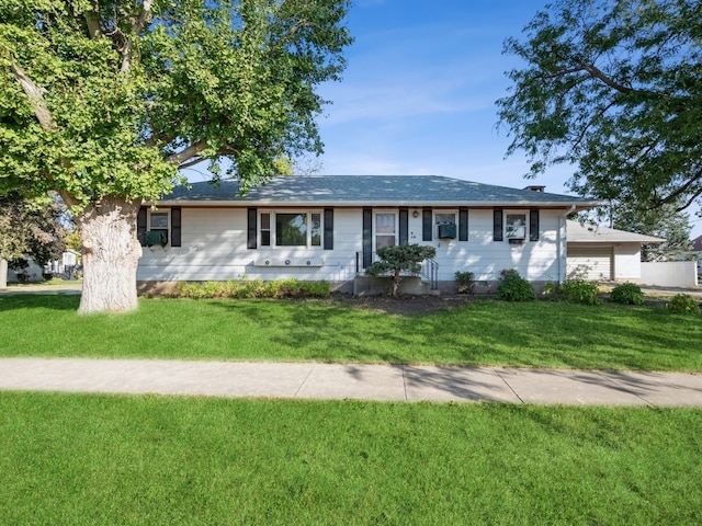 single story home with a front yard