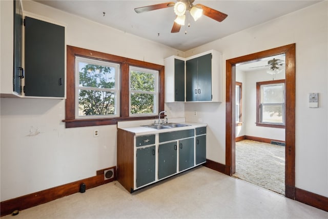 kitchen featuring sink and ceiling fan