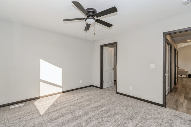 unfurnished bedroom featuring ceiling fan and hardwood / wood-style floors