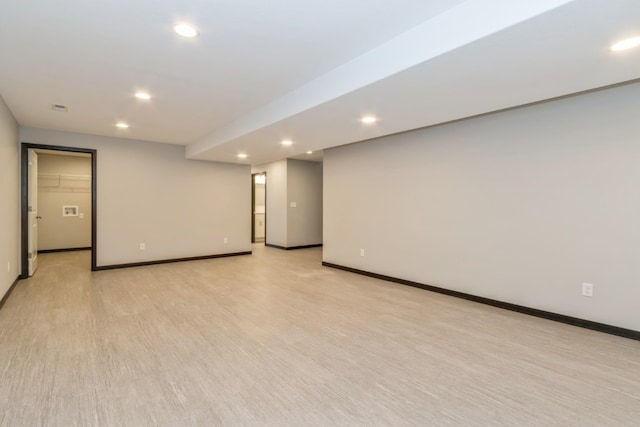 spare room featuring light hardwood / wood-style flooring