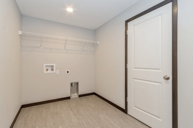 laundry room featuring light hardwood / wood-style flooring, hookup for an electric dryer, and washer hookup