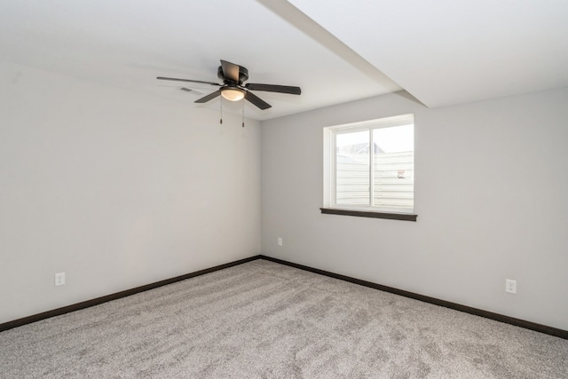 carpeted empty room with ceiling fan