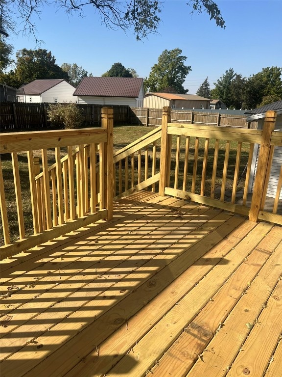 deck featuring a storage unit