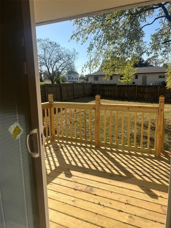 deck featuring a lawn