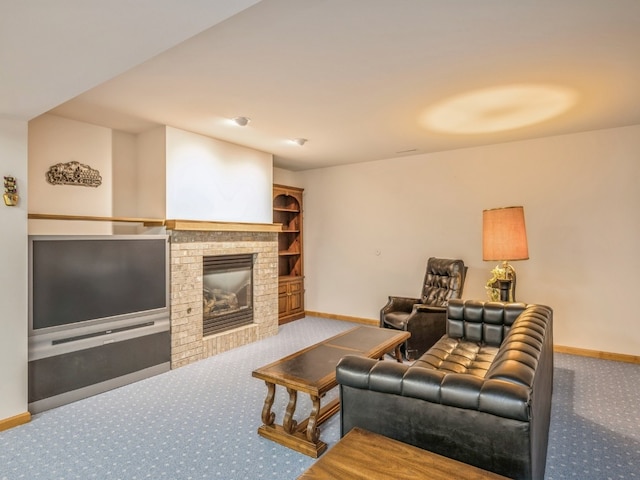 living room with a fireplace and carpet floors