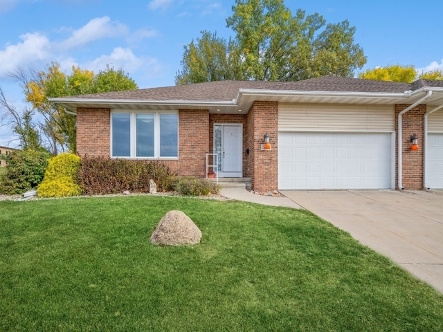 single story home featuring a front yard and a garage