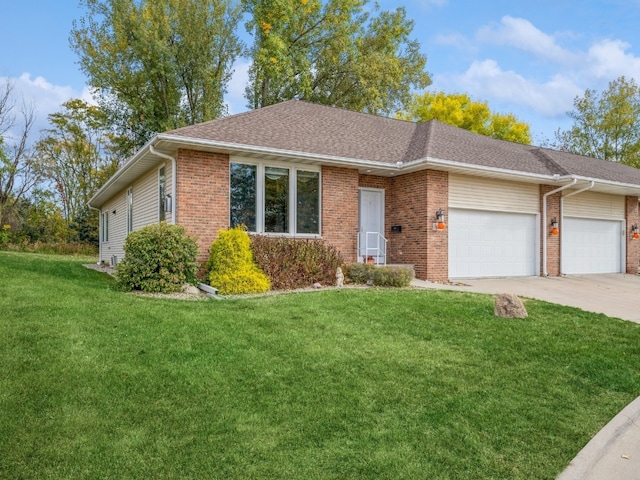 ranch-style house with a front lawn and a garage