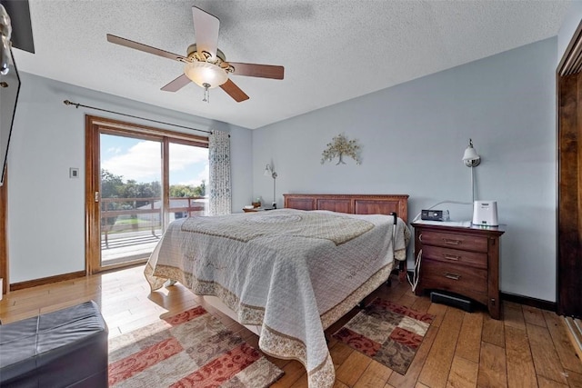 bedroom with access to exterior, a textured ceiling, light wood-type flooring, and ceiling fan